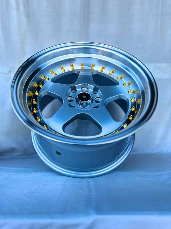 6089R	R16 9J	ET15	4x100 / 4x114,3	73,1	Silver Polish Lip Gold Rivets