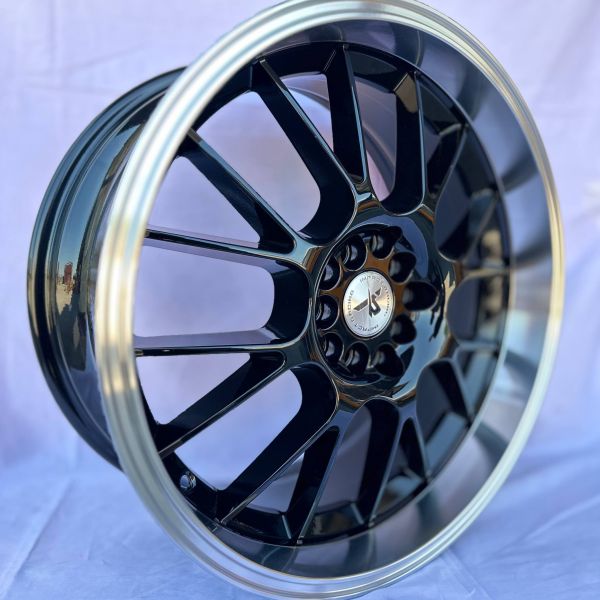 0414	R18 8J	5x100 / 5x114,3	ET38	73,1 	Gloss Black Machined Lip