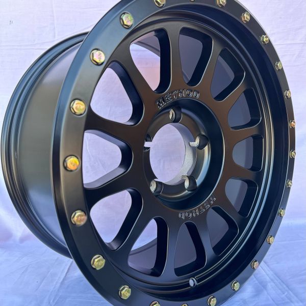 0301	R18 9J	5x139,7	ET0	112,0 	Matt Black  + Bronze Rivets