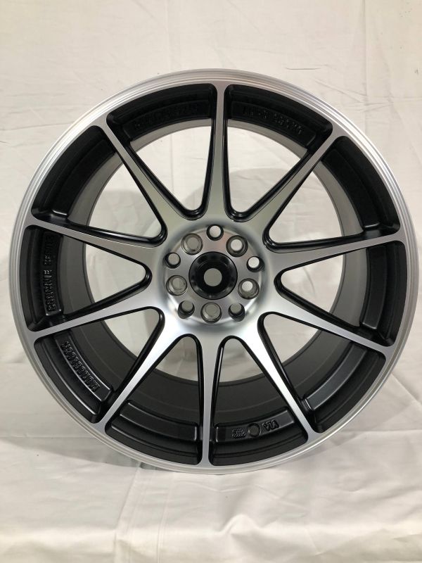 0051 XXR R17 9J 5x100 / 5x114,3 ET25	73,1 SMATE BLACK MACHINE
