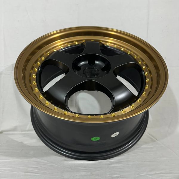 ks089 R19 9,5J 5x114,3 ET35 ЦО 67,1 SEMI MATT BLACK +BRONZE LIP +GOLD RIVET